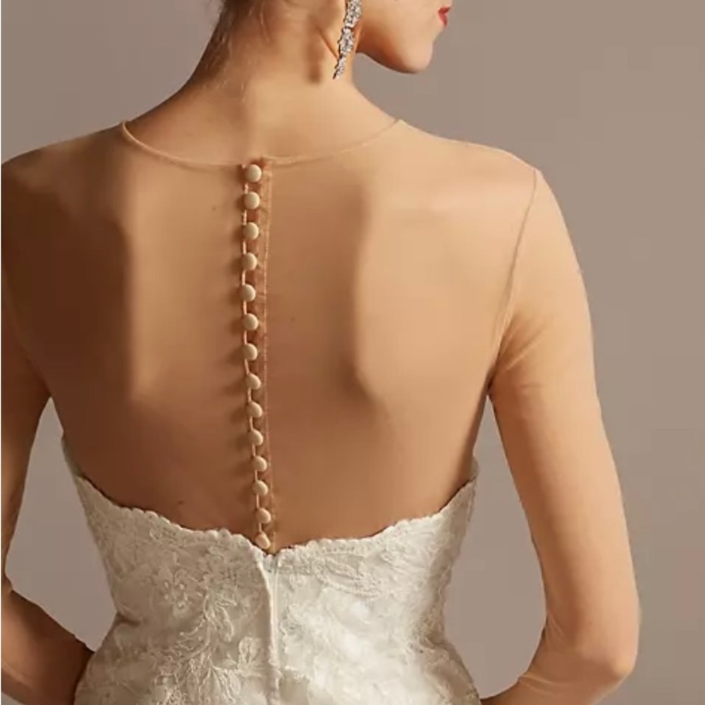 long-sleeve tulle wedding dress topper.  Color is dark champagne